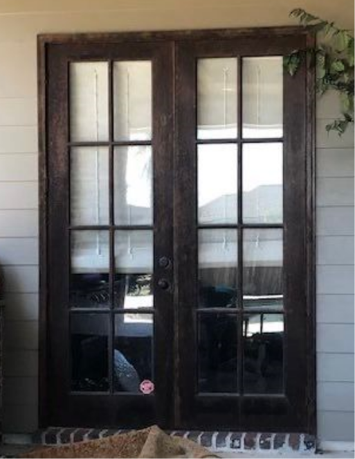before - a fiberglass french door with laminate glass