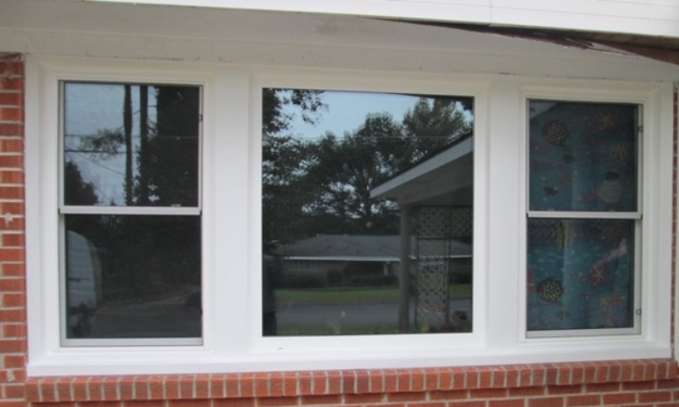 after - three window unit, two double hung with picture window in middle impact-resistant glass. Can help with possibly getting an energy tax credit.