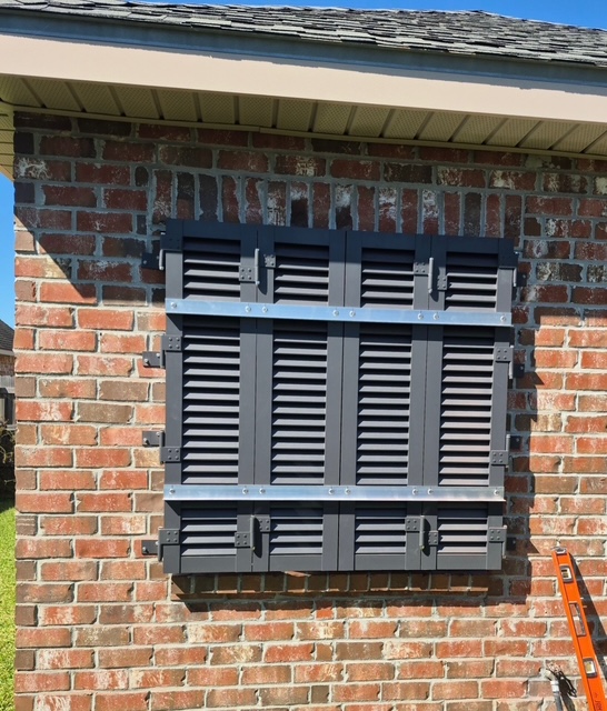 closed hurricane shutter Rayne colonial